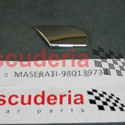 980139734 LH HEADLIGHT WASHER PLATE